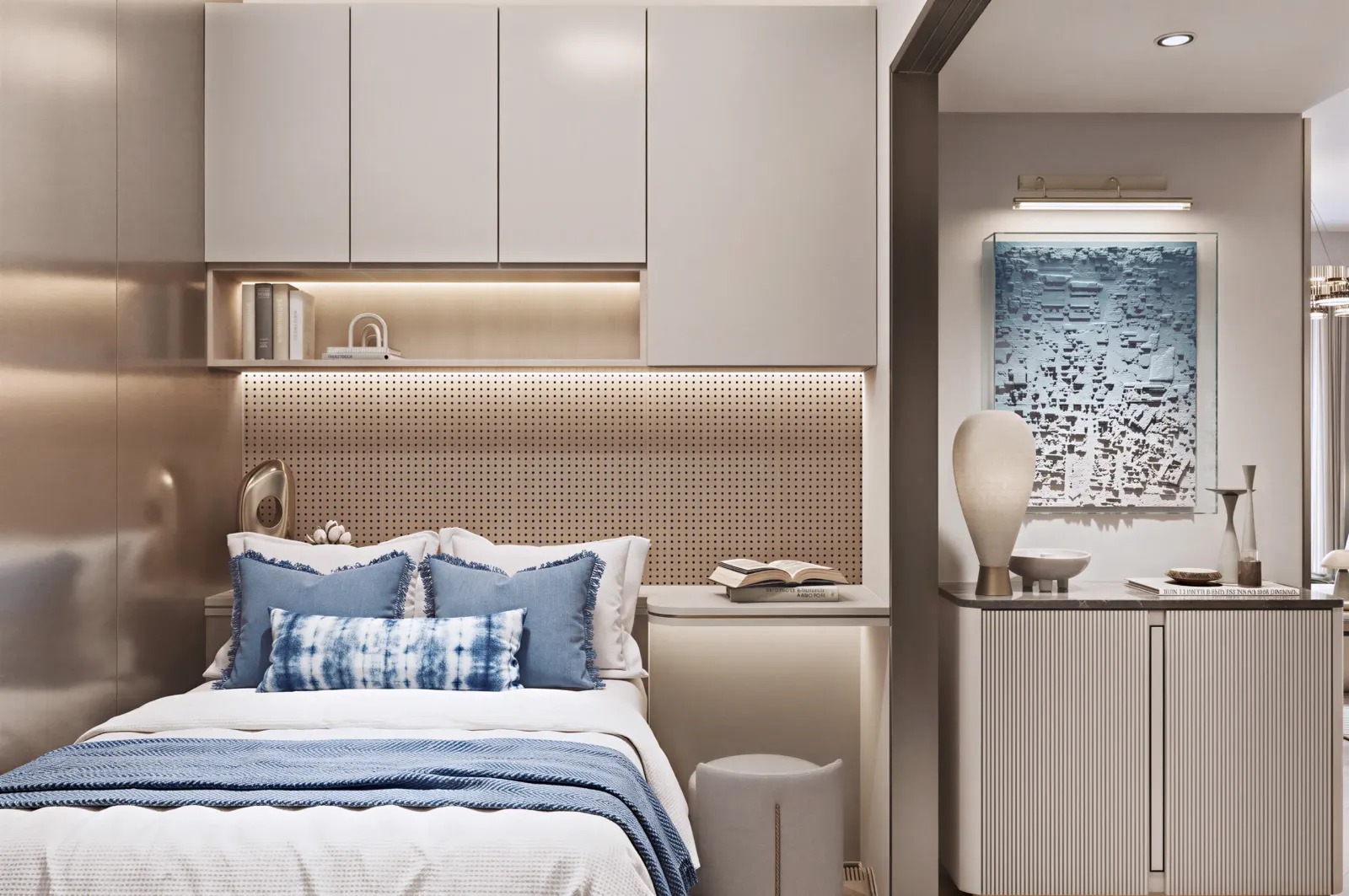Bedroom alcove with built-in cabinetry and a blue artwork.